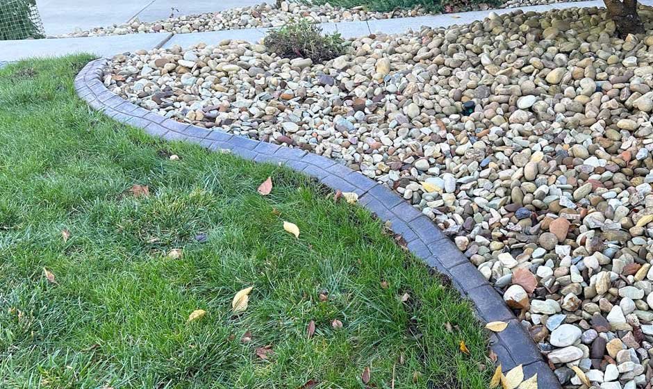 Concrete Curbing vs. Plastic or Metal Edging: Which Lasts Longer?
